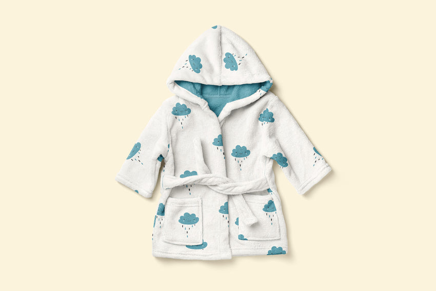 Plush cloth robe with blue rain clouds pattern on white on the outside, and all blue inside.
